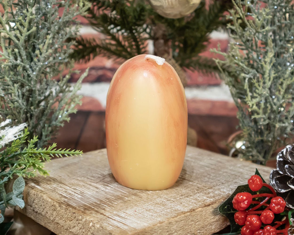 Close-up of hand-painted Santa Head Beeswax Candle made in the USA with authentic detail