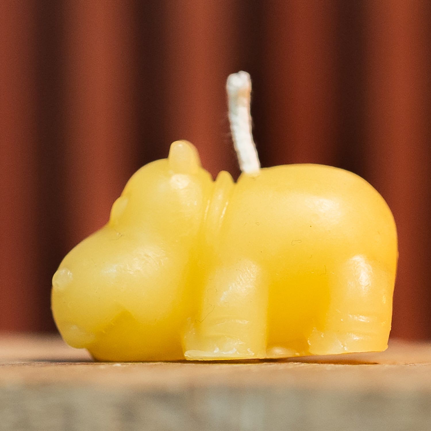 Side view of Mini Hippo Candle Mold showing flexible urethane rubber for easy candle release.