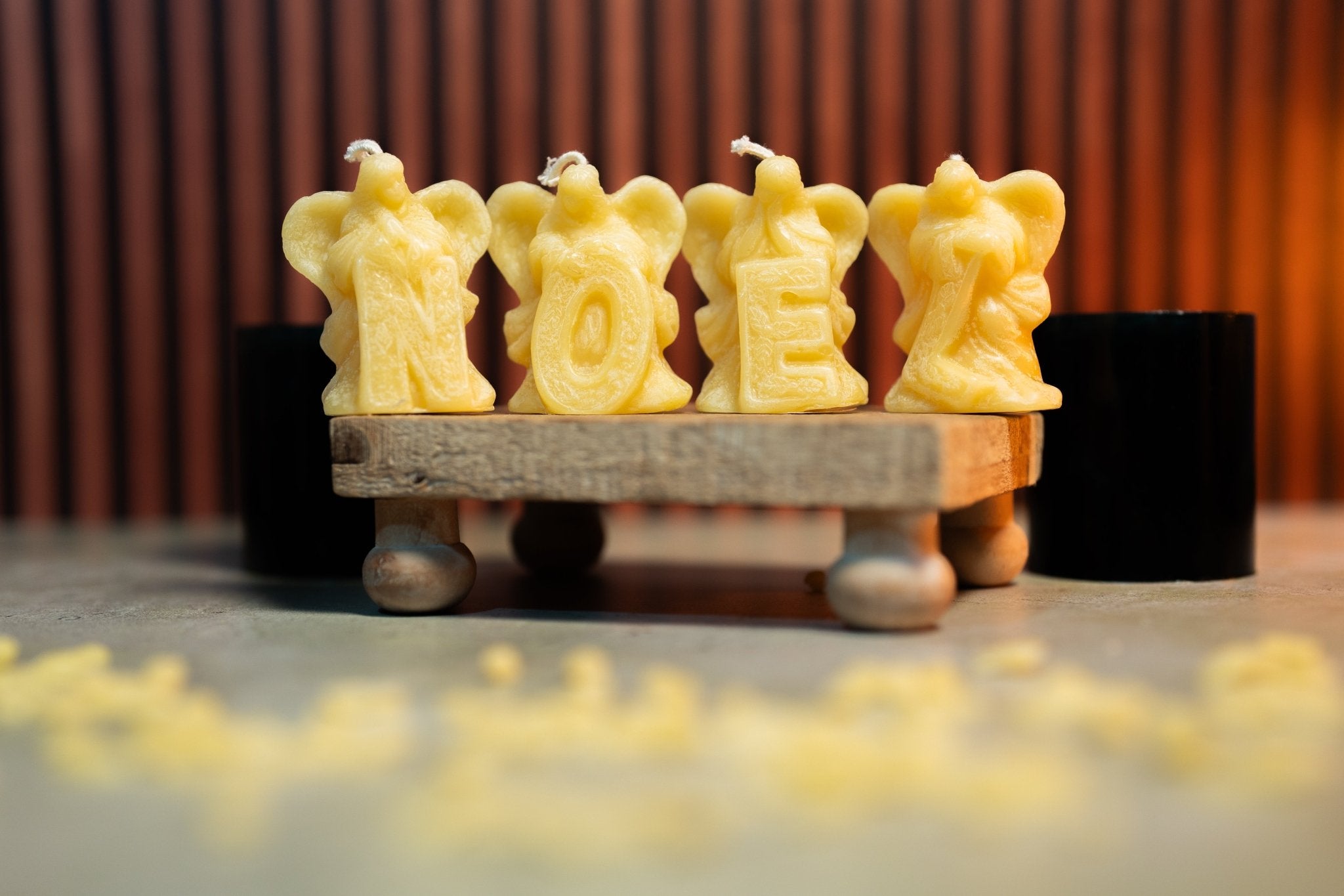 N.O.E.L Angel Molds for beeswax, each angel forming a letter in NOEL