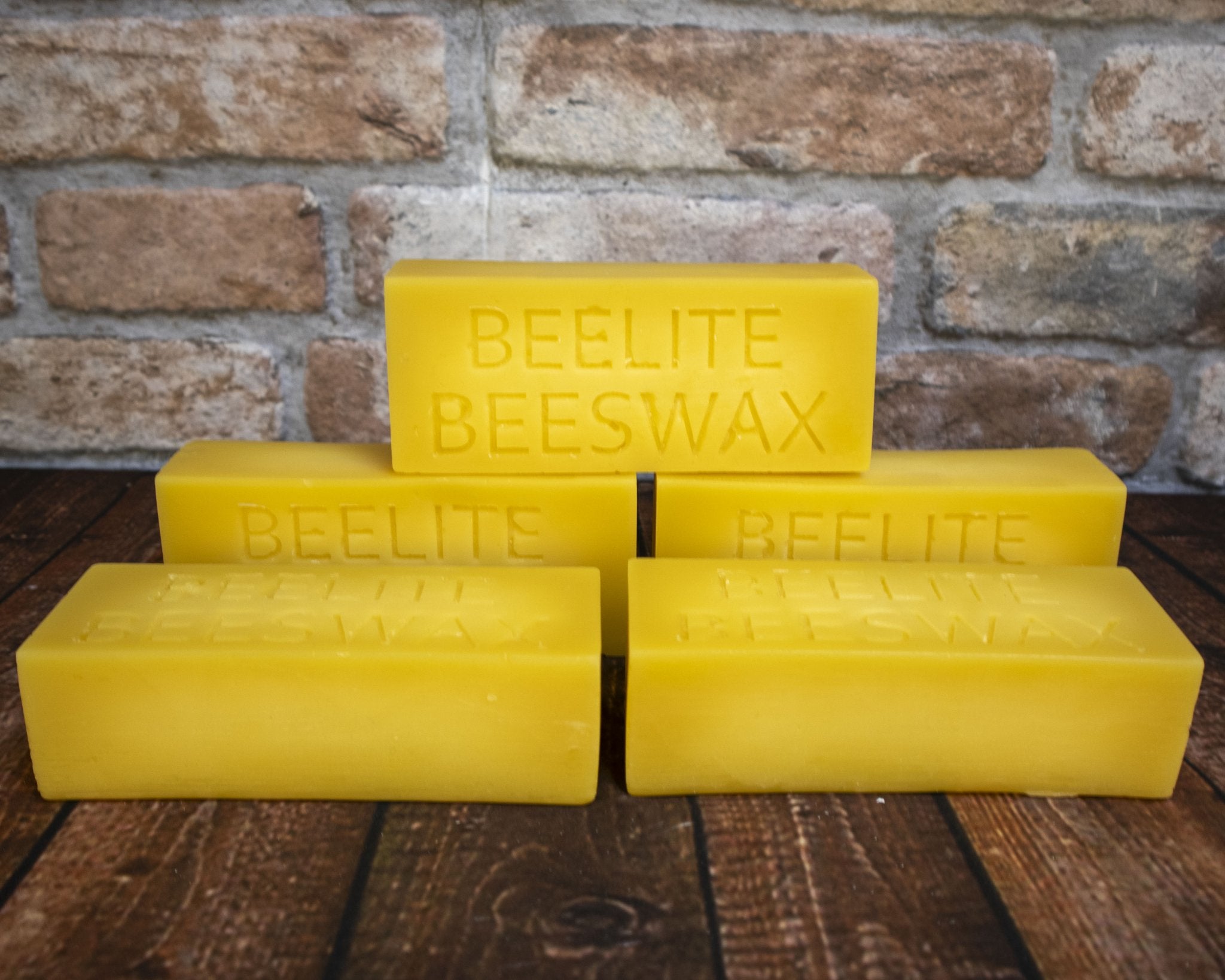 Stack of 100% pure beeswax blocks for candle making natural yellow filtered beeswax