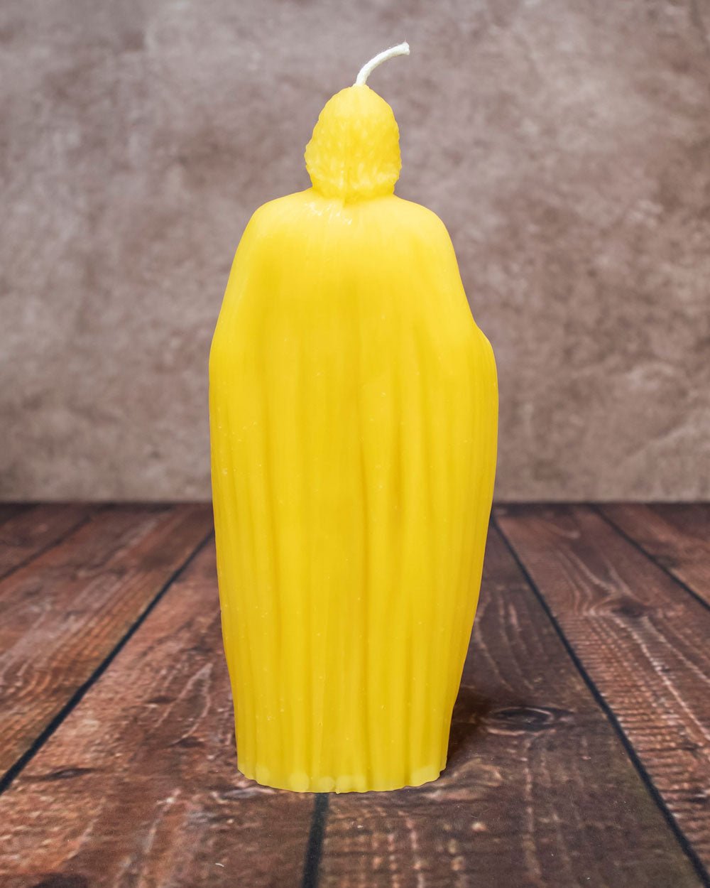 Rear view of Holy Family beeswax candle handmade in the USA, showcasing smooth natural beeswax finish and cotton wick.