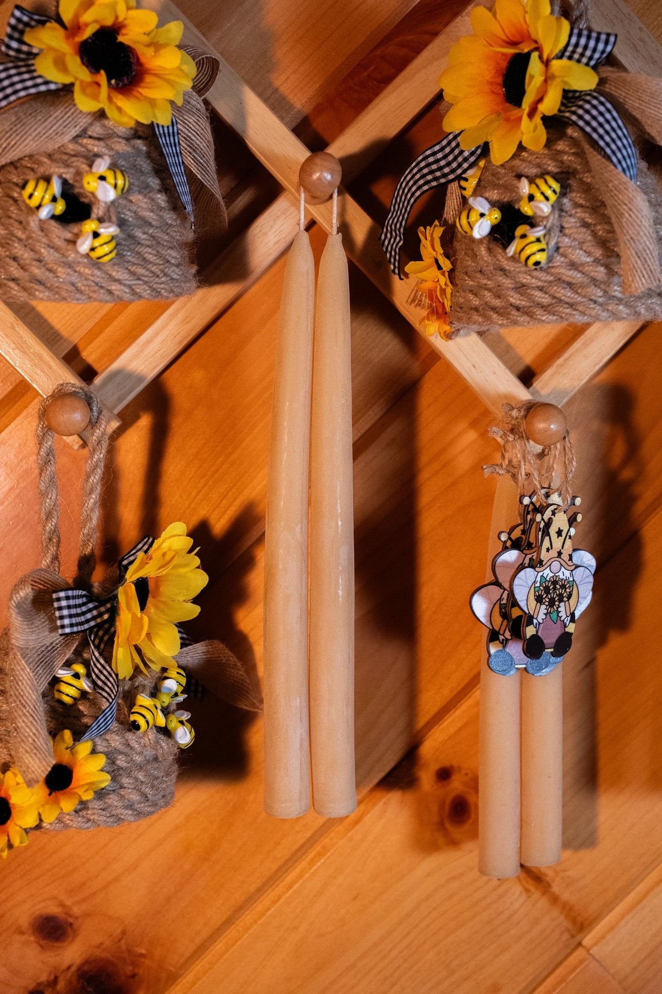 Pure beeswax tapers hand-dipped in yellow beeswax by Beelite Candles